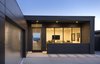 From the front entrance to the back patio, the structure acts as a portal that establishes views of the striking scenery from every room. Photo 2 of Glenhaven Residence modern home