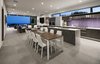 An open and fluid layout makes the smaller space feel substantial, finished with minimal and cool-toned neutrals. Photo 5 of Glenhaven Residence modern home