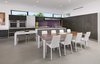 Purple mosaic tile adds a pop of color the the minimal kitchen. Photo 6 of Glenhaven Residence modern home