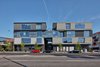 There is a history to this site that has come full circle with the opening of the new metro line station. The project site’s history dates back to its existence as a railroad station that was frequented with freight trains. Photo of PLATFORM modern home