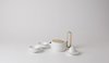 Researching tea rituals, Luca Nichetto noticed that tea in Russia is served in handleless bowls, which inspired the shape of the vessels. Photo of Coffee and Tea Seen Through Designers' Eyes modern home