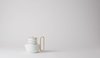 The bowls can be stacked on top of the pot for more streamlined storage. Photo of Coffee and Tea Seen Through Designers' Eyes modern home