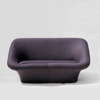 Designed in the 1960s and covered in a purple stretch jersey fabric, Paulin’s Mushroom Sofa was a perfect representation of his charming style. 