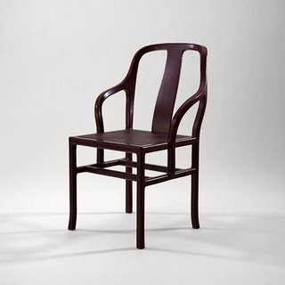 Also exhibited was his Chaise à Palmette, beautifully constructed of lacquered wood and a cane seat. 