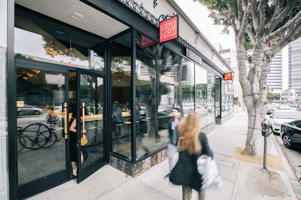 The new location is located in the Westwood neighborhood of Los Angeles, which follows the first version being posted in Downtown L.A. The bottom of the exterior facade is lined with a stone border while large front windows keep the space from feeling separated from the neighborhood.