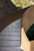 Modern home with Staircase and Concrete Tread. The materials throughout the house are durable and are meant to make people feel genuinely relaxed. Mcllwee explains, “It’s not a tremendously big house, but it’s mesmerizing.” Photo 8 of The Garcia House