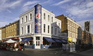 Located smack-dab in London’s Notting Hill district, The Distillery sits on a bustling corner of the iconic market street and is marked by a classic, nostalgic facade.
