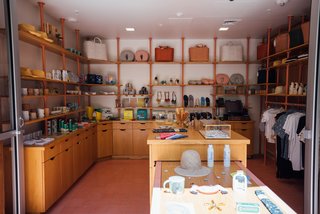 The store sells a mix of goods, some of which have been made custom for the hotel including hats by Kiriko, beach towels and hats with the hotel’s wallpaper pattern, and the ukuleles that are in each guest room.