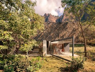 This retreat for two by Mexican architecture group EDAA flawlessly meshes with its surroundings in an elegant response to the landscape formed by native Tepoztecos over 500 years ago.