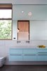 The pale blue of this bathroom in the main house creates a peaceful, serene atmosphere.
#paleblue #bathroom #color #bright #beachhouse #minimal #modern #relaxing #interstice #intersticearchitects #interiorarchitecture #bathroomdesign #bradlaughton #bradlaughtonphotography Photo 20 of TreeHugger modern home