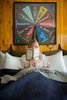Modern home with Bedroom and Bed. The walls of the suite's main room are lined with amber-shellacked pine, recalling Wandawega's cabins—and retro family basements. Photo 8 of Graduate Madison