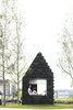 The Urban Cabin includes a sofa that doubles as a twin bed, a small porch and amble glazing.
Photo: Sophia van den Hoek Photo of Book a Stay in This 3D-Printed Tiny House modern home