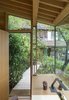 Modern home with Office, Storage, Study Room Type, Desk, Lamps, and Chair. Sited just steps from the main house, it’s now a welcoming retreat that they share. Photo 3 of Cutler Studio/Bunkhouse