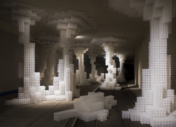 The units are comprised of 27 spheres. Held together by hot glue, the units can connect to each other by the Velcro fasteners at the corners.