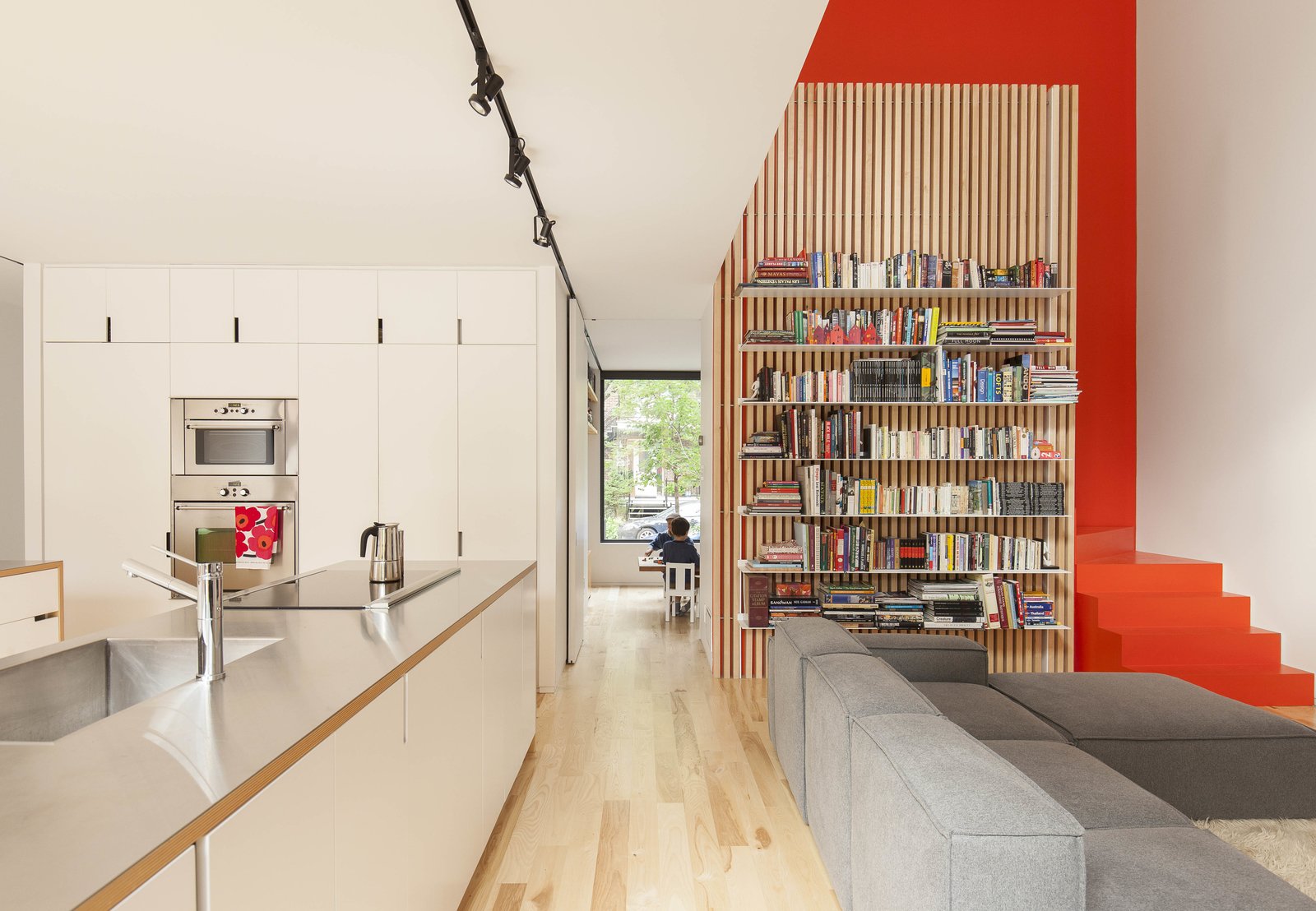 12 Functional Modern Home Libraries Dwell   The Open Plan Kitchen And Living Room In The De Gaspe House In Montreals Villeray Neighborhood Borrows Natural Light From A Double Height Space Over The Seating Area 