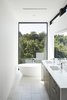 Modern home with Bath Room and Freestanding Tub. Master bathroom Photo 3 of Lipan House