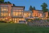Modern home with Outdoor, Trees, Grass, Shrubs, Large Patio, Porch, Deck, Back Yard, and Landscape Lighting. Photo courtesy of Holmes, King, Kallquist & Associates provided by Marvin Windows and Doors; project submitted to 2017 Marvin Architects Challenge Photo 2 of Modern Waterfront Residence