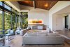 Modern home with Living Room, Chair, Sofa, Coffee Tables, and Ceiling Lighting. Photo courtesy of Holmes, King, Kallquist & Associates provided by Marvin Windows and Doors; project submitted to 2017 Marvin Architects Challenge Photo 8 of Modern Waterfront Residence
