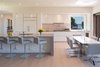 Modern home with Kitchen, Ceiling Lighting, and Refrigerator. Photo courtesy of Holmes, King, Kallquist & Associates provided by Marvin Windows and Doors; project submitted to 2017 Marvin Architects Challenge Photo 6 of Modern Waterfront Residence