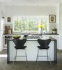 Modern home with Kitchen, Ceiling Lighting, White Cabinet, Concrete Floor, Ceramic Tile Backsplashe, Subway Tile Backsplashe, Undermount Sink, and Wall Oven. Architect Elizabeth Herrmann’s Knoll House project, Best Transitional category winner of 2017 Marvin Architects Challenge.
Photo 5 of Knoll House