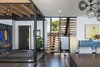 Modern home with Staircase. Photo courtesy of Rehkamp Larson Architects provided by Marvin Windows and Doors Photo 4 of Lake Edge