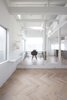 Modern home with Living Room, Chair, Table, Light Hardwood Floor, and Shelves. The living room is arranged on the second floor to create a sunny and comfortable environment. Photo of Cat House