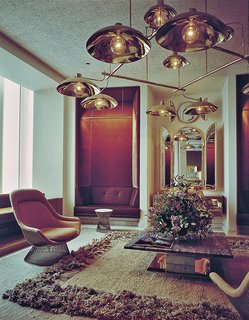 The Windows on the World reception room, designed by Warren Platner in 1976, included a Platner Easy Chair and Platner Side Table. Photograph courtesy of the Nestlé Library.