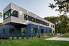 Modern home with Exterior, House, Wood Siding Material, Flat RoofLine, and Prefab Building Type. exterior facade and cantilever Photo 4 of Springs Residence