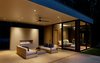 Modern home with Exterior, Wood Siding Material, Flat RoofLine, Beach House Building Type, Small Home Building Type, House, and Glass Siding Material. poolhouse Photo 20 of Springs Residence