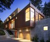 Modern home with Exterior, Metal Siding Material, House Building Type, Flat RoofLine, and Concrete Siding Material. Copper and concrete facade at dusk, street side Photo 17 of Mt. Tam House
