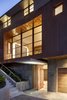 Modern home with Exterior, Metal Siding Material, Flat RoofLine, House Building Type, and Concrete Siding Material. detail of facade at dusk Photo 16 of Mt. Tam House