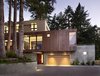 Modern home with Exterior, Stucco Siding Material, House Building Type, Metal Siding Material, Concrete Siding Material, and Flat RoofLine. Facade at dusk from street Photo 15 of Mt. Tam House