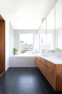 Bath Room, Wall Mount Sink, Soaking Tub, and Alcove Tub A simple fern can add color and movement to a bathroom corner, and it especially likes the humid temperature.