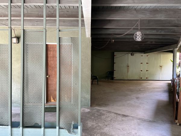 The original entryway to the home lacked a clear focus, and Wang sought to make it distinctive in the renovation.