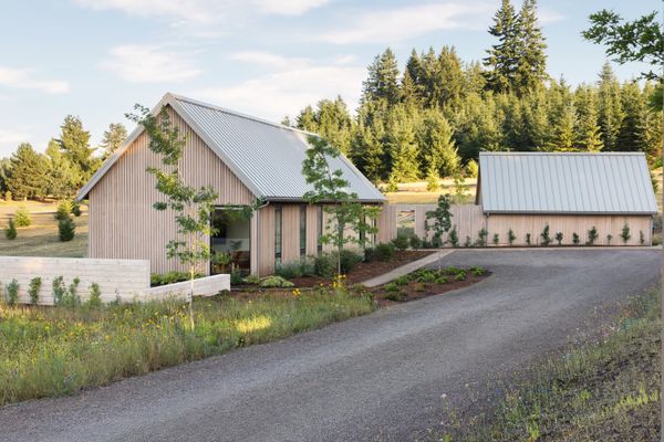 The 3,200-square-foot home is connected to a shed out back, which has an office and storage space.