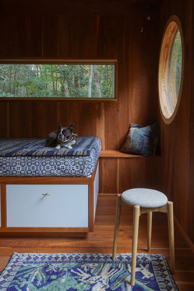 All of the wood in the cabin is locally-sourced cherry, which they carried to the site by hand.