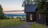Modern home with Outdoor. Quiet, dark volumes emphasize the natural beauty and views of Hood Canal. Photo of The Coyle