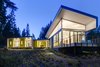 Modern home with Exterior, Metal Siding Material, Metal Roof Material, House Building Type, Shed RoofLine, and Cabin Building Type. The main house includes a generous amount of outdoor space, extending the living area into the surrounding forest. Photo of Whidbey Artists' Retreat