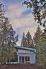 Modern home with Exterior, House Building Type, and Cabin Building Type. The exterior aesthetic confidently contrasts to its natural setting, creating discrete objects carefully set into the landscape. Photo 3 of Whidbey Artists' Retreat