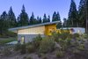 Modern home with Exterior, House Building Type, Metal Siding Material, Metal Roof Material, Cabin Building Type, and Shed RoofLine. Dynamic rooflines create interesting forms while simultaneously opening clerestory windows perfect for letting in natural light to each studio. Photo 6 of Whidbey Artists' Retreat