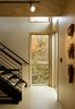 Modern home with Staircase, Wood Tread, and Metal Railing. Intricately-detailed stairs climb the tower, moving from exterior to interior and from more enclosed to more open spaces. Photo 4 of Tower House