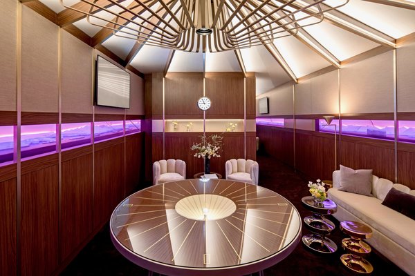 Inspired by Rolex&rsquo;s iconic Explorer model, which debuted in 1953, a cocktail table displays an Explorer II watch.