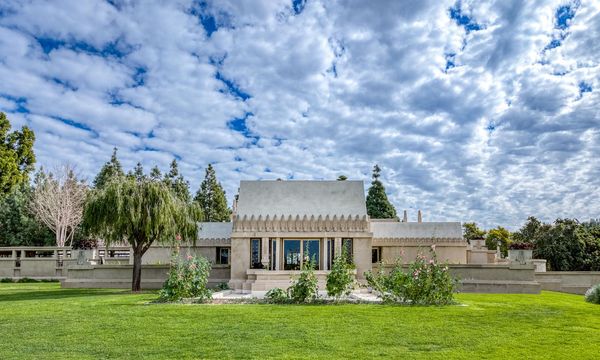 The TK facade of the house. In contrast to Wright’s earlier Midwestern-inspired Prairie-style designs, the temple-like Hollyhock House was influenced by pre-Columbian architecture, notably Mayan and Aztec styles, though some have also described it as Asian or Egyptian. The result was something the architect called 
