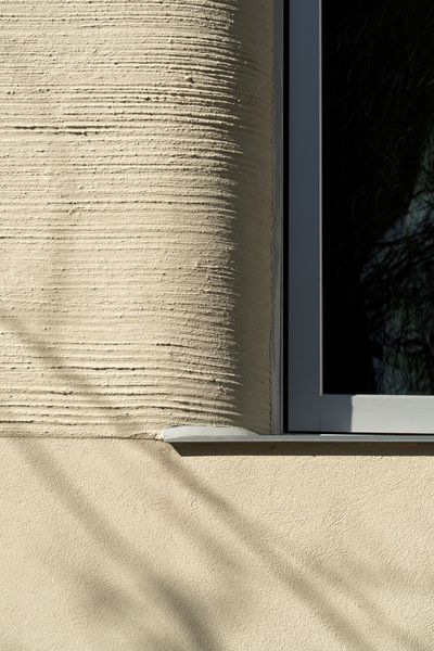 Textured stucco adds interest on the exterior.