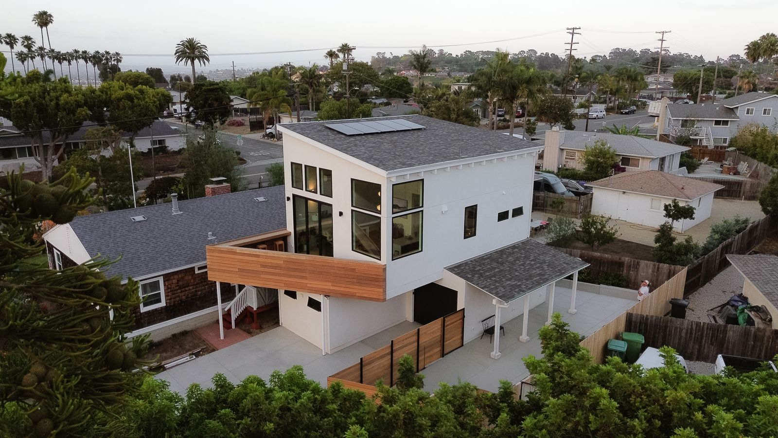 The red balau deck brings a natural element to the exterior, while complementing the existing house on the property.