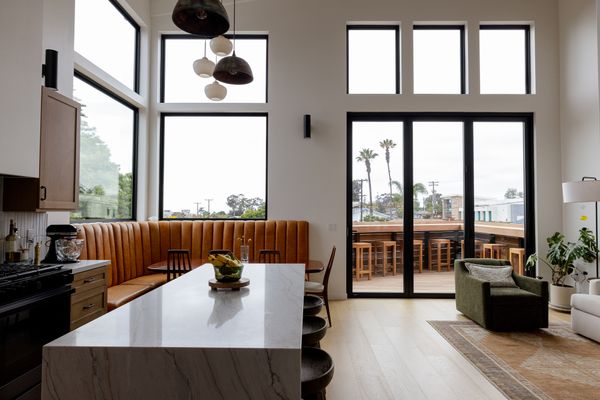 The couple splurged and bought La Cantina doors for the opening to the deck, along with the large corner windows from Milgard in the dining area.