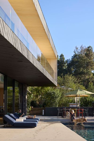 The second floor, which contains bedrooms, a home office and a gym is angled slightly from the lower volume to capture the views west to the Silver Lake Reservoir.