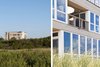 Modern home with House Building Type, Wood Siding Material, Metal Siding Material, Grass, Field, Trees, Slope, and Exterior. North elevation/Southwest facade details Photo 5 of Dune Road Beach House