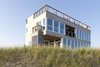 Modern home with Exterior, Beach House Building Type, and House Building Type. Southwest corner from beach Photo 4 of Dune Road Beach House