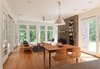 Kitchen, dining, and living occupy one large open space Photo 18 of Catskills Suburban modern home